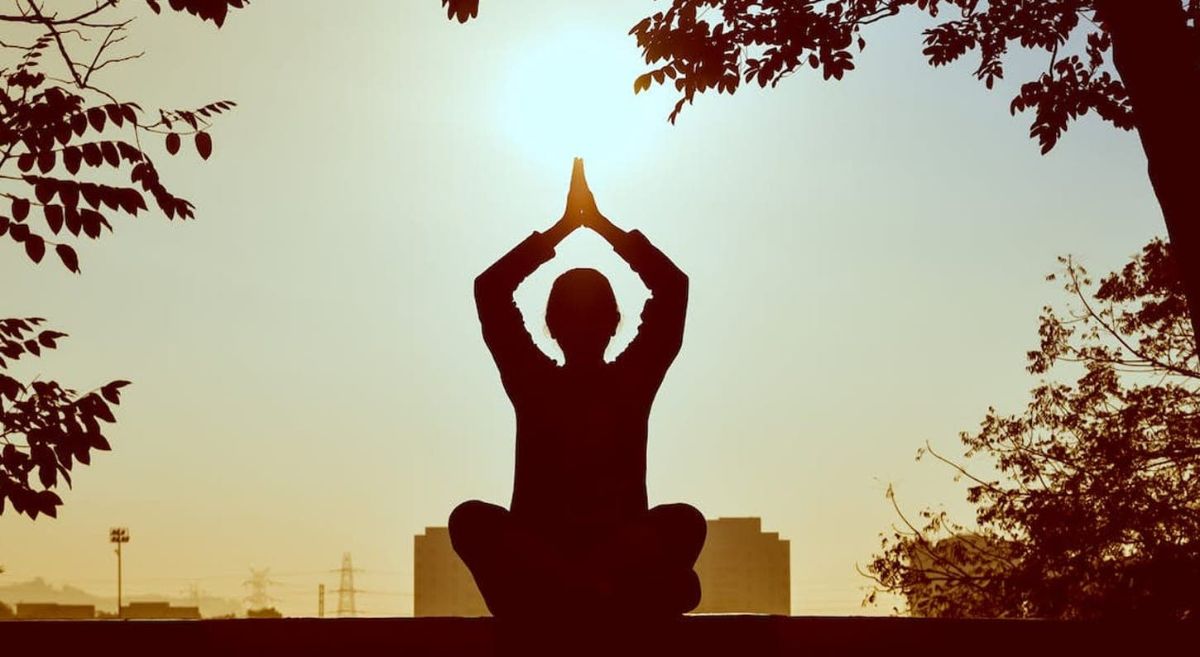 Person practicing yoga